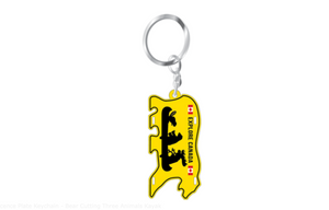 Al. Licence Plate Keychain - Bear Cutting Three Animals Kayak